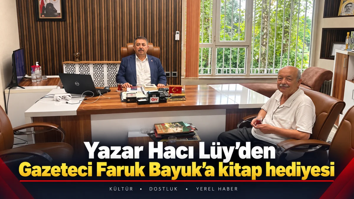 Yazar Hacı Lüy’den Gazeteci Faruk Bayuk’a kitap hediyesi